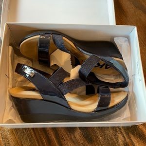 Ladies’ AK Sport Memory Foam platform shoes.